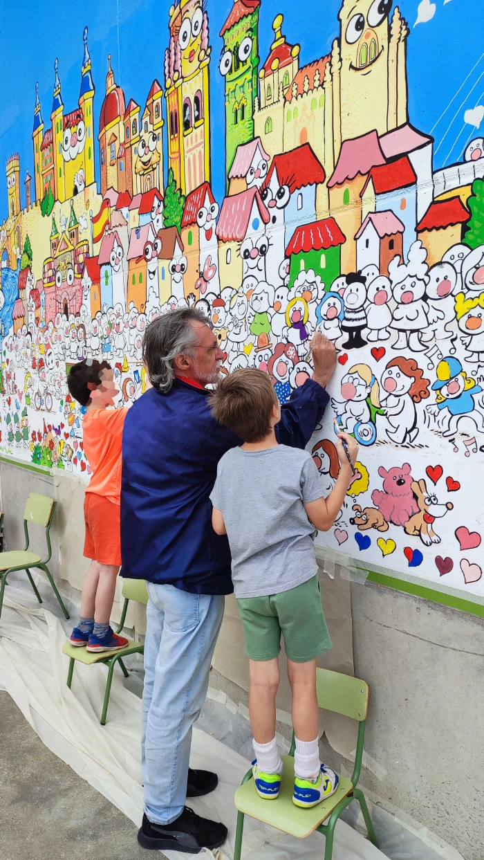 Toni Reollo pintando mural CEIP